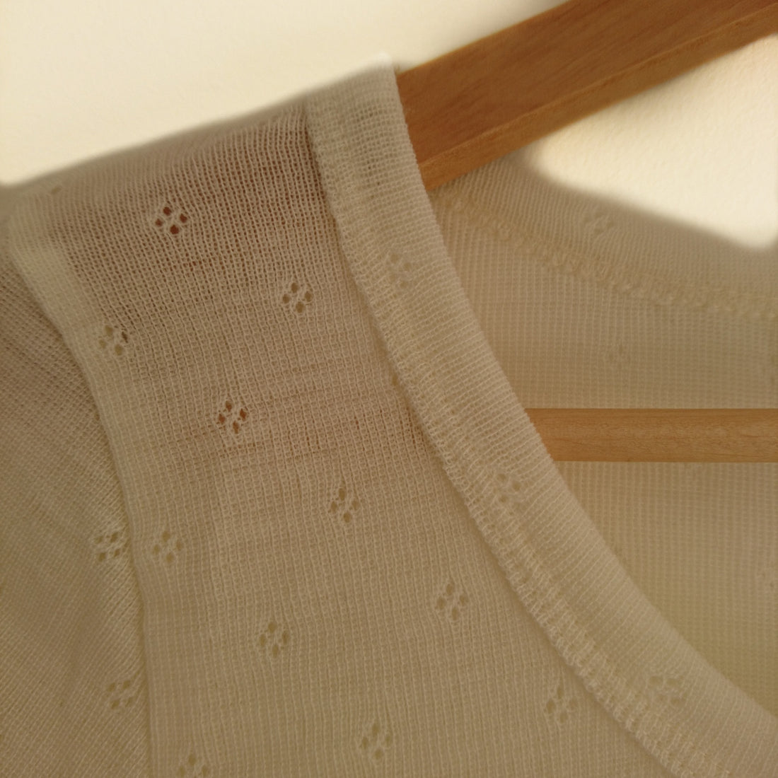 Introducing the Pretty Pointelle Merino Wool Vests for Comfort and Warmth