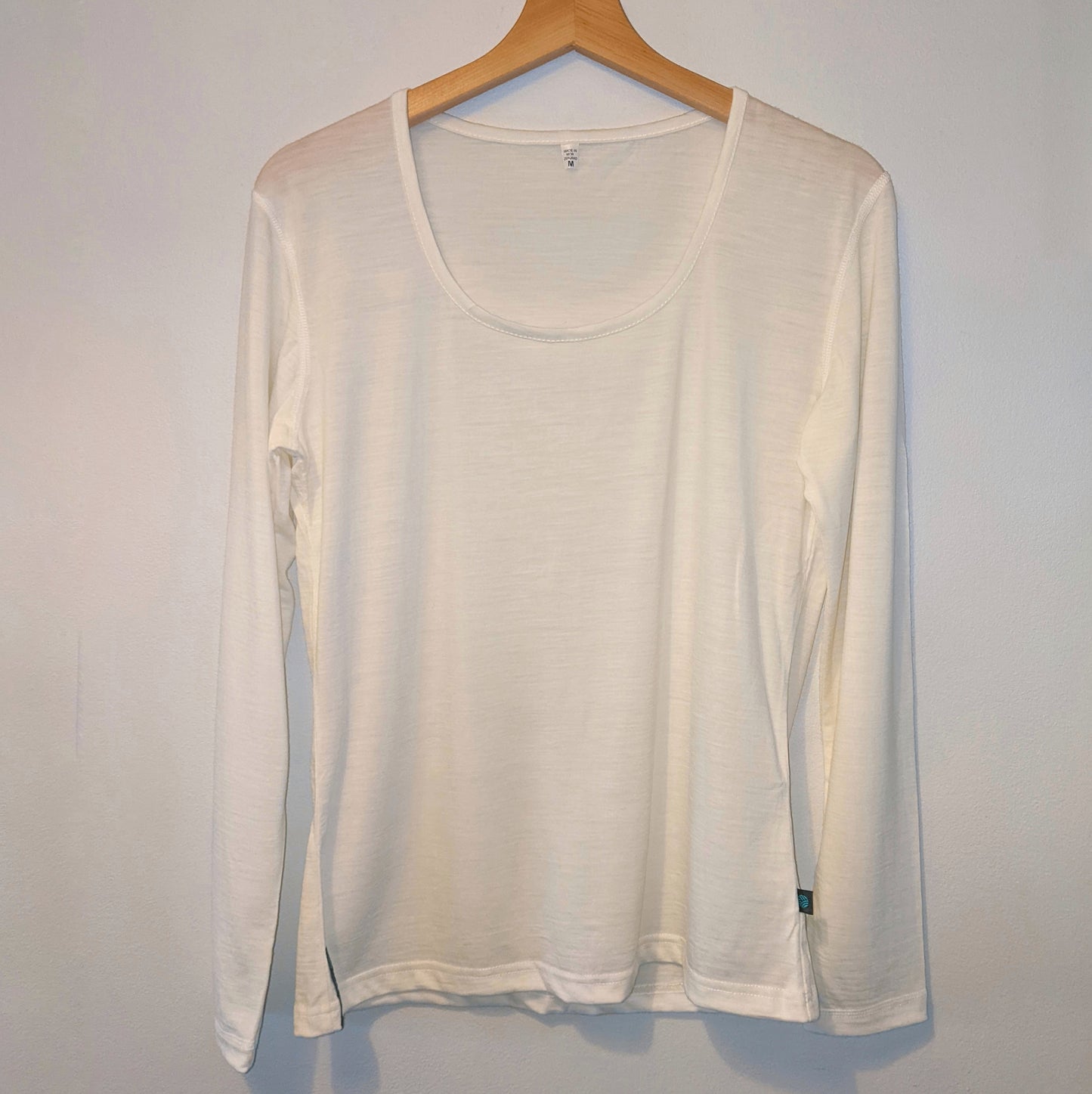 Soft White Long Sleeved Scoop Neck Merino Wool Womens Vest