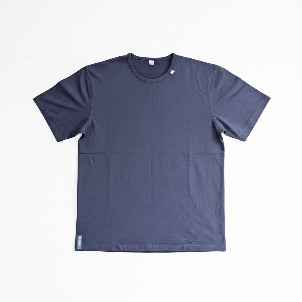 A dark navy blue short-sleeve merino wool crewneck t-shirt laid flat against a clean white background.