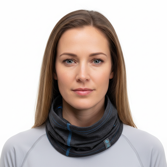 Adult female model wearing Charcoal Merino Wool Neck Gaiter with light grey base layer